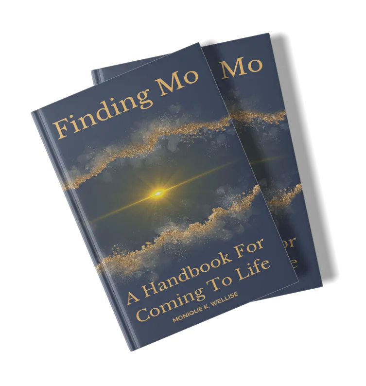 Two copies of "Finding Mo: A Handbook For Coming To Life" by Monique K. Wellise, angled presentation